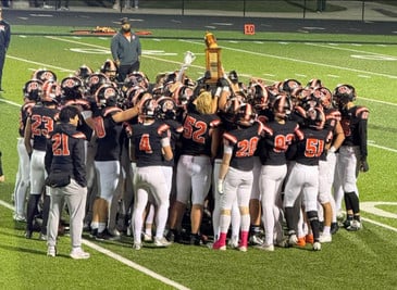 GHS varsity football team winning conference championship